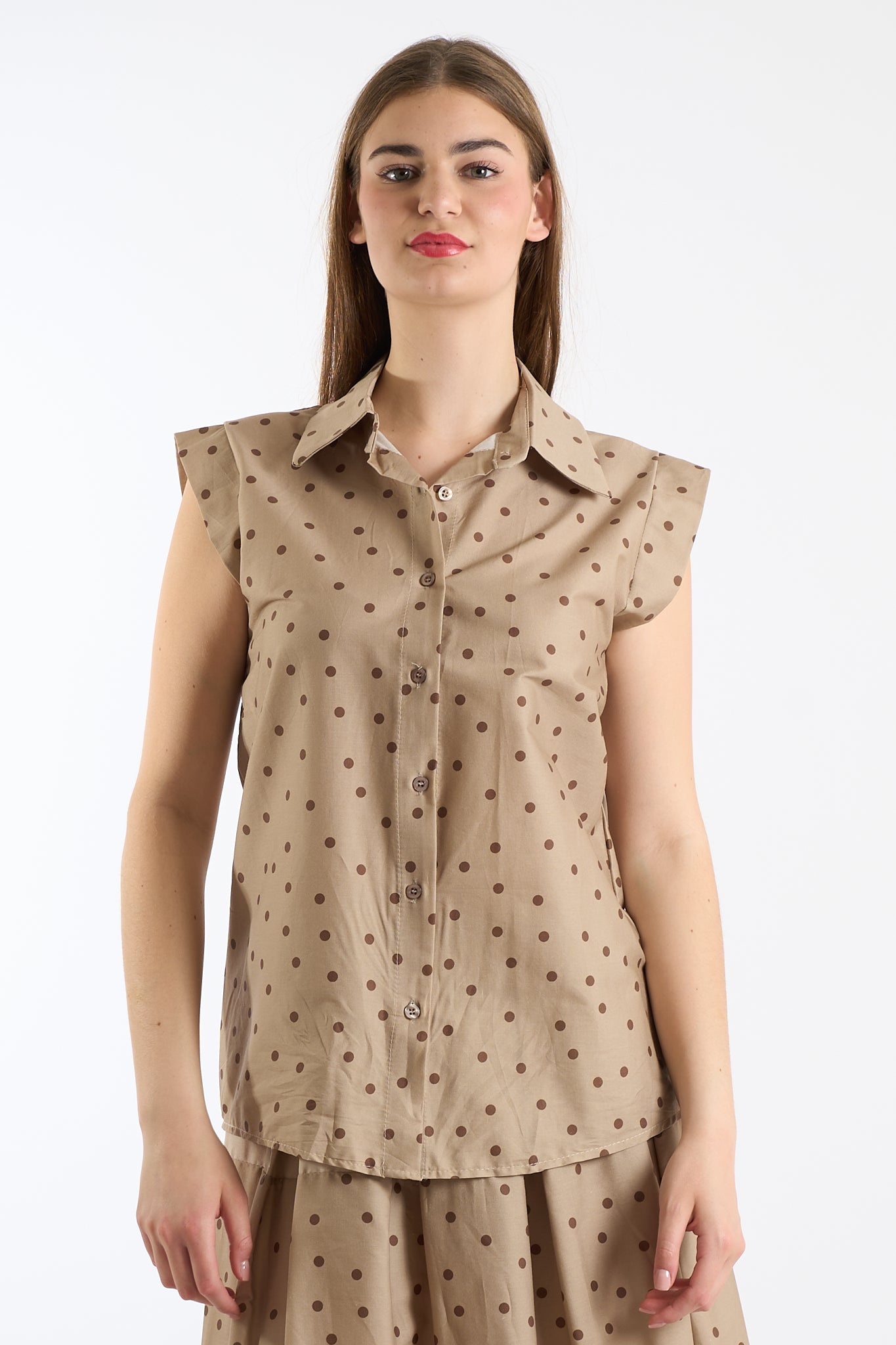 Camicia smanicata pois