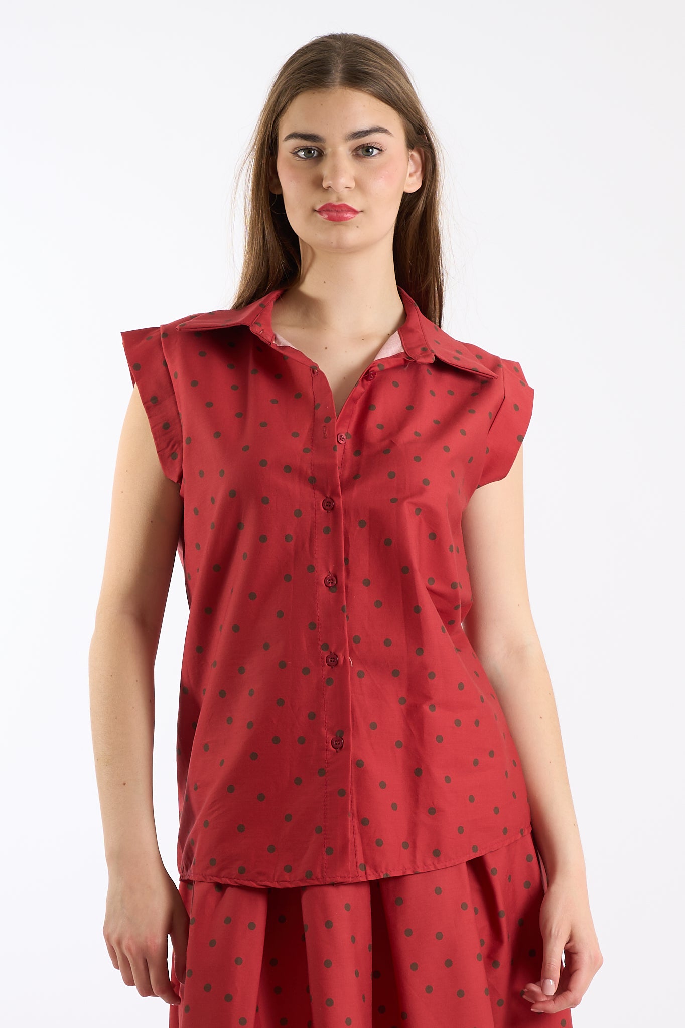 Camicia smanicata pois