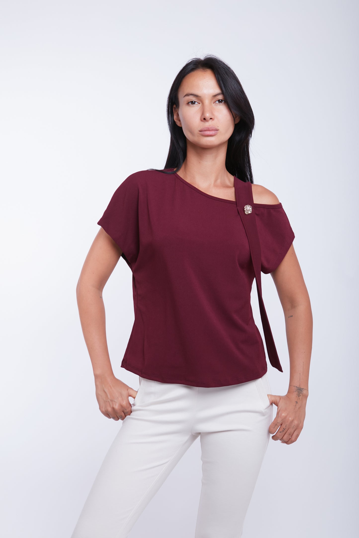 MAGLIA DETTAGLIO BOTTONE