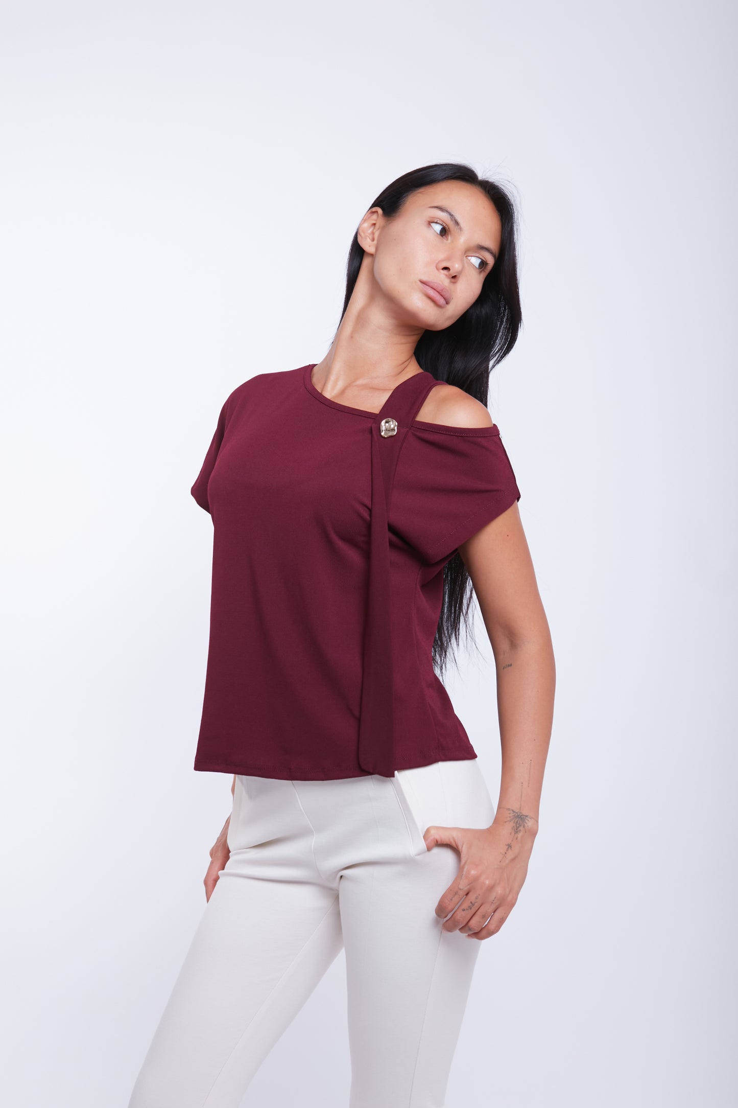 MAGLIA DETTAGLIO BOTTONE